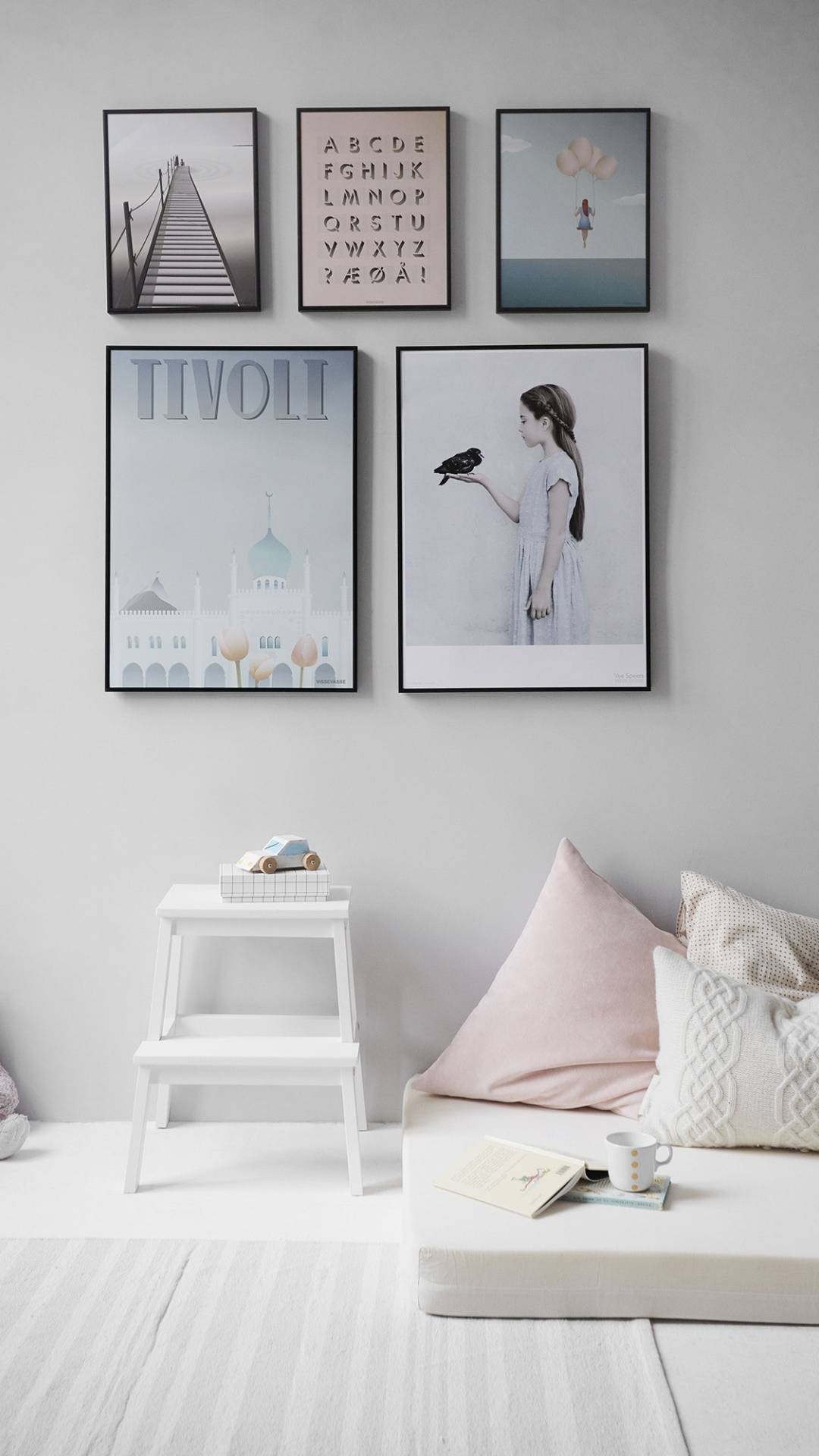 There are so many different ways to use wall art in your living room.