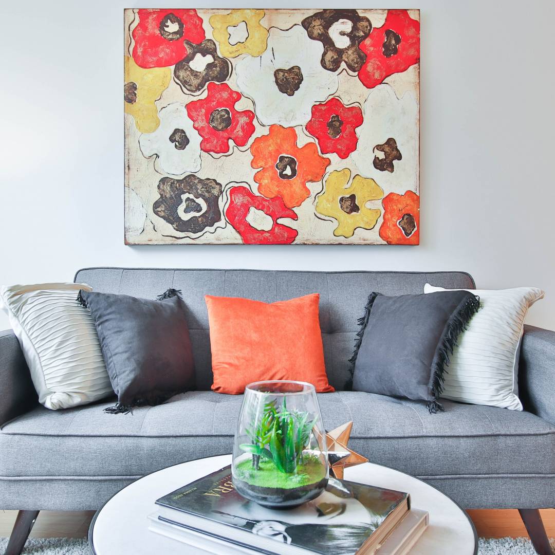 Choose a large piece of art for your living room wall